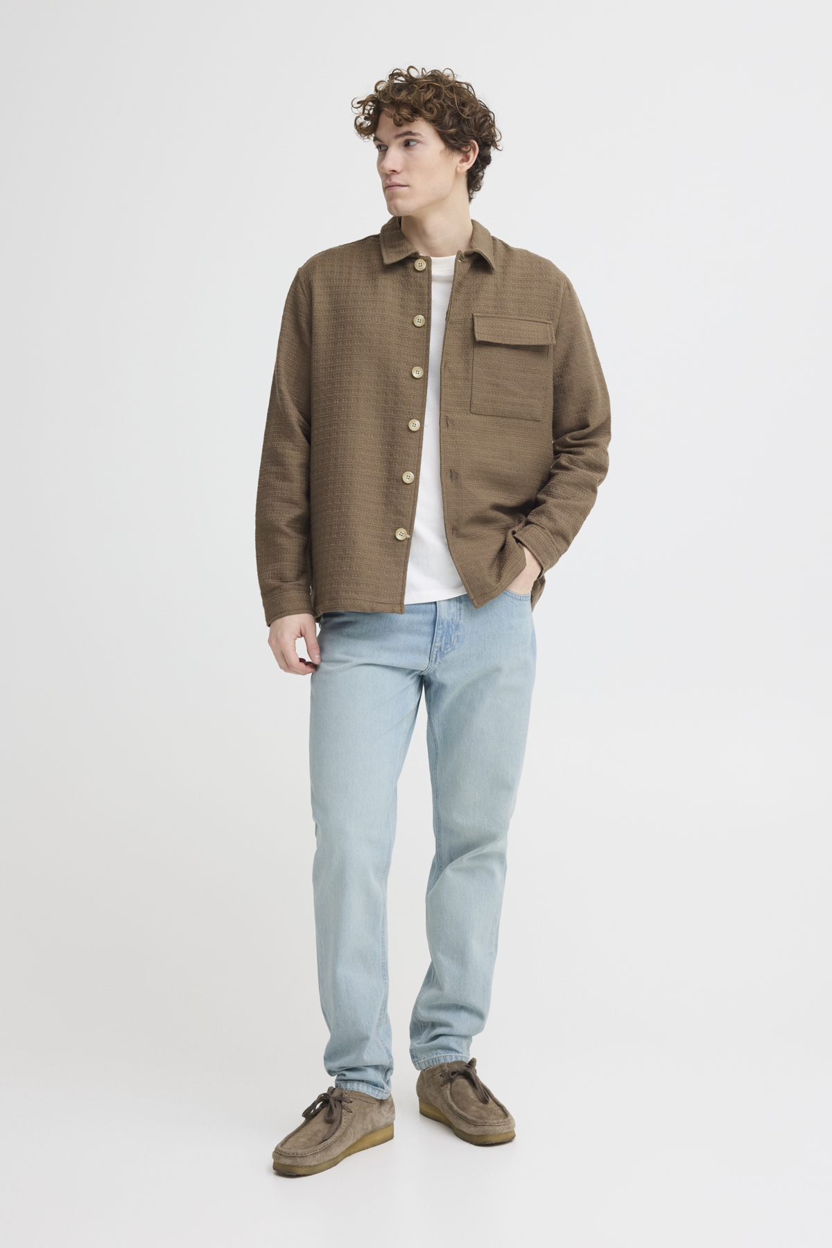 mens light wash straight leg jeans relaxed fit vintage blue denim light blue mens denim jeans front view casual outfit minimalist style mens relaxed fit jeans light wash detail front pockets soft denim texture