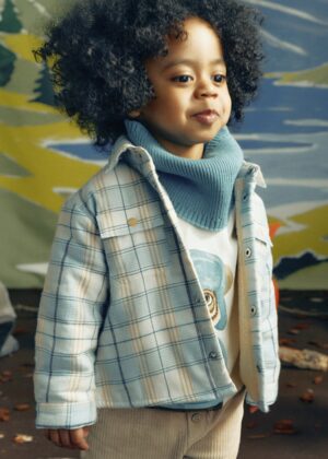 Boys’ long-sleeve button-up shirt in a blue, cream and beige checked plaid pattern, featuring a classic collar, wooden-look buttons and two chest flap pockets, displayed against a plain light background.
