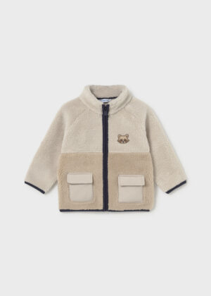 Mayoral baby boys’ beige and taupe teddy fleece jacket with a textured finish, navy front zip, contrast edging, two flap pockets and an embroidered animal face motif.