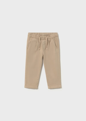 Baby boys’ beige casual trousers featuring an elasticated waistband, adjustable drawstring, front side pockets and straight legs.
