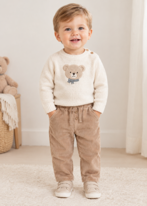 Baby boy wearing Mayoral corduroy trousers in Hazelnut.