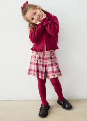 Close-up of the checked pattern on the Mayoral girls’ raspberry shorts