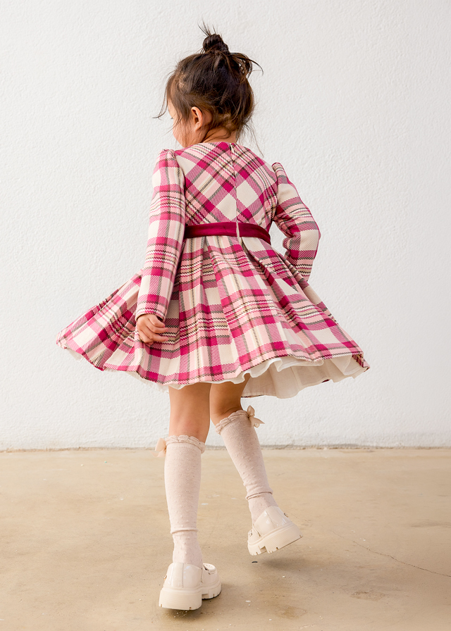 Close-up of the checked pattern on the Mayoral girls’ raspberry dress